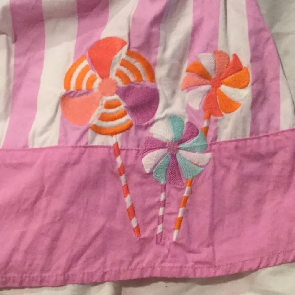 Lollipop dress with corresponding hair bow worn 1x